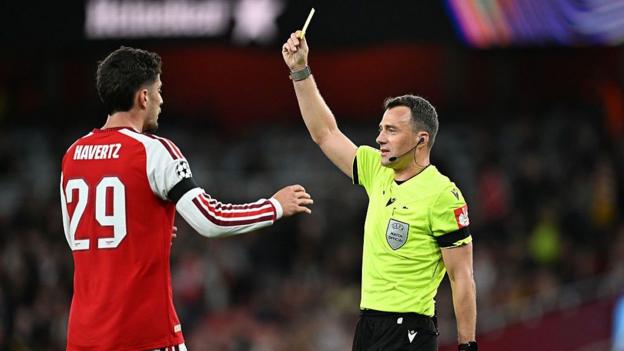 Kai Havertz being shown a yellow card in the Champions League